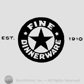 Black star in the center of a circle. Fine Dinnerware is written around, inside a black double outlined circle. East. Written on the left side, 1910 written on the right side of the circle.