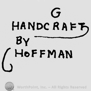 Written on 4 lines: G, Handcraft, By, Hoffman