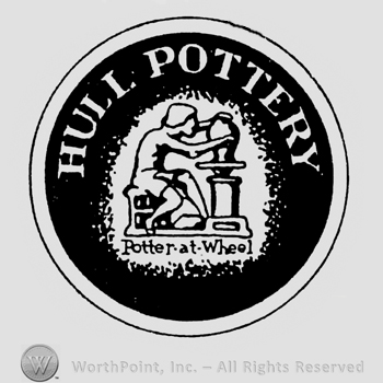 Image of a working potter inside a circle. Hull Pottery written above. Black background.