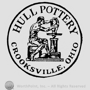 Image of a working potter, Hull Pottery written above, Crooksville, Ohio written under. Inside a circle.