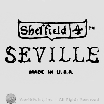 Sheffield on the left, image of an eagle on the right, inside a rectangle on top. Seville Made in USA written under.