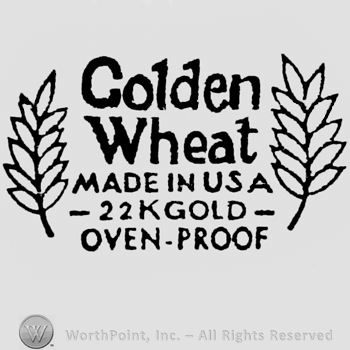 Golden Wheat, Made in USA, 22 K Gold, Oven proof written between two wheat grains of wheat