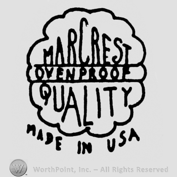 Writing Mancrest up Quality down Ovenproof middle between two lines all inside a floer shape Made in USA under