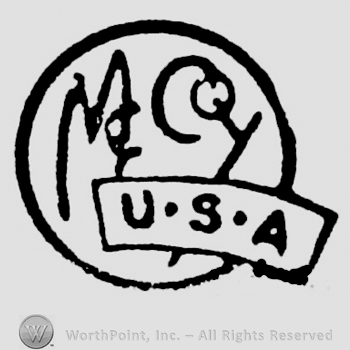 Writing Mc Coy inside circle USA on label