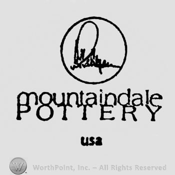 Signature inside circle up writing Mountaindale Pottery USA under