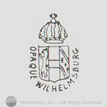 a crown above a  shield and "opaque wilhelmsburg" written around it with uppercase letters
