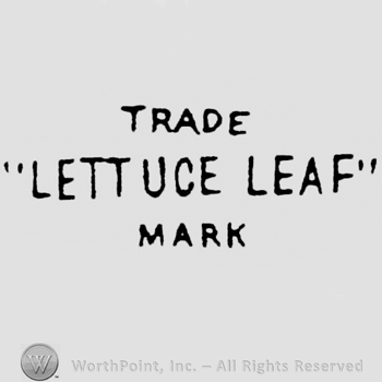 Trade written on top, Lettuce Leaf written in the middle between quotation marks. Mark written on the bottom