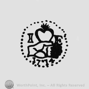 crowned hand, initials on one side and another I on the left, E on the right