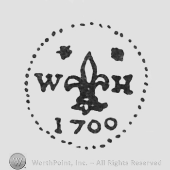fleur-de-lis between initials W H, 1700 written under