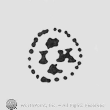 flowers on top and on the bottom, initials in the middle J K