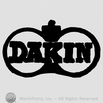 Dakin written with uppercase letters over two circles and a crown