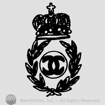 Coat of arms with crown and mirrored capital C inside