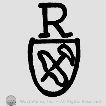 Shield with hammer and an oval design, uppercase R above