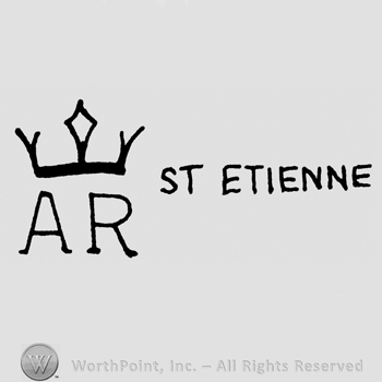 Uppercase AR under a crown, St. Etienne written with uppercase letters