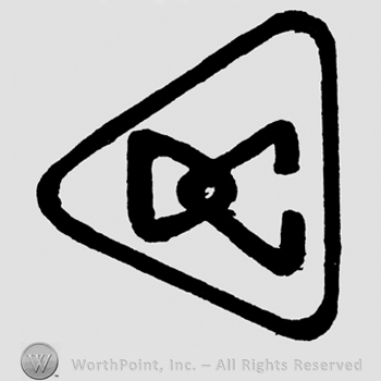 Uppercase DC inside a triangle
