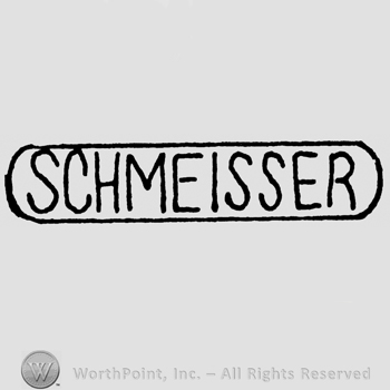 Schmeisser written with uppercase letters inside a rectangle with round corners