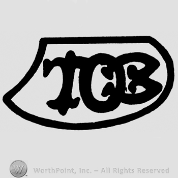 Uppercase TOB written inside a shield