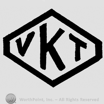 Uppercase VKT inside a diamond shape