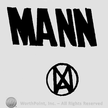 Mann written with uppercase letters, round complex design below