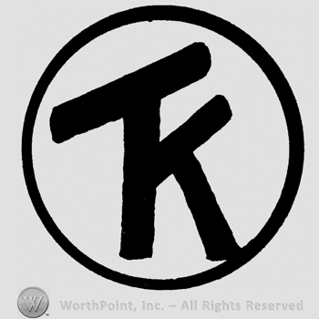 Uppercase TK inside a circle