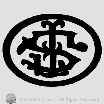 Uppercase ornamented letters inside an oval