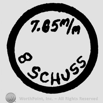 Uppercase Schuss written inside a circle, 7.65 m/m also written inside the circle