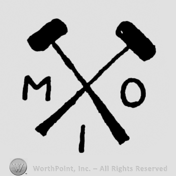 two crossed hammers and the initials MIO