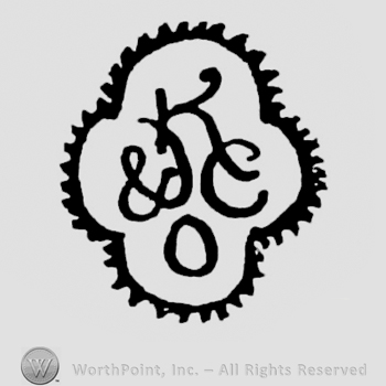 a flower logo with the initials KE&O inside
