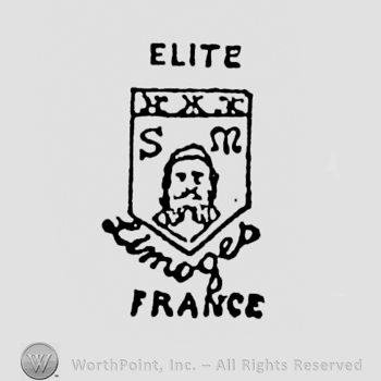 Shield with a man head; ELITE LIMOGES FRANCE written.