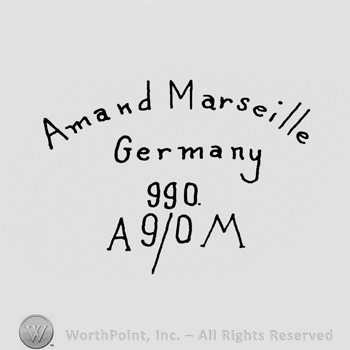 the text Armand Marseille Germany 990 A 9/0 M