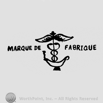 a pair of wings above two coiled serpents above a lamp and the text Marque de Fabrique