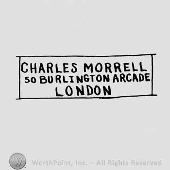 a rectangular sign that contains the name and adress of the company:  CHARES MORRELL SOBURLINGTON ARCADE LONDON.