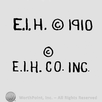 the initials EIH 1910 and EIH CO INC written bellow.