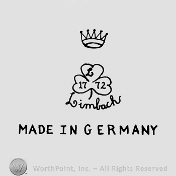 a crown above a clover leaf and MADE IN GERMANY written bellow.