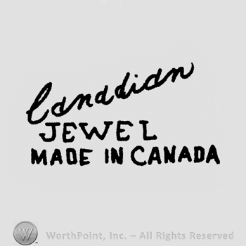 "Canadian" handwritten, "Jewel Made in Canada" written below on two rows with uppercase letters