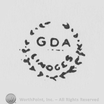 GDA Limoges written with uppercase letters inside an circle of olives branches