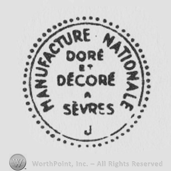 Manufacture Nationale Dore et Decore Sevres written with uppercase letters inside a circle