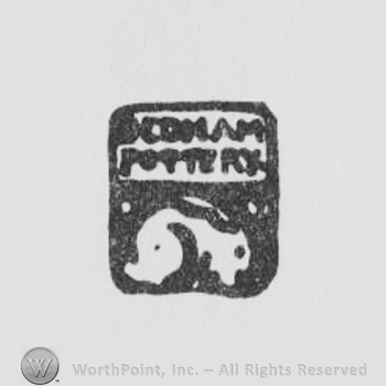 simple square design with a rabbit inside and DEDHAM POTTERY