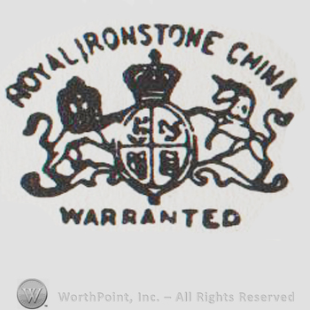 Blazon with two pranced animals, lion on the left, unicorn on the right, ROYAL IRON STONE CHINA written with uppercase letters above the blazon and WARRANTED written in uppercase below the blazon