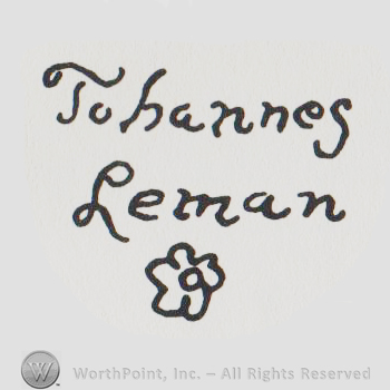 the company name in handwriting above a flower