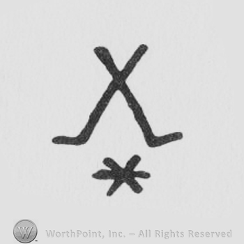 two crossed lines formind an X above an asterisk