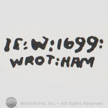 the text IE W 1699 WROT HAM in uppercase