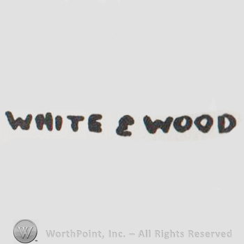 White & Wood written with uppercase letters