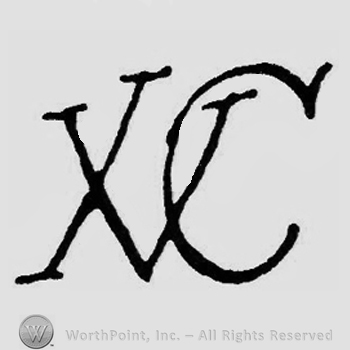 Letters X C written.