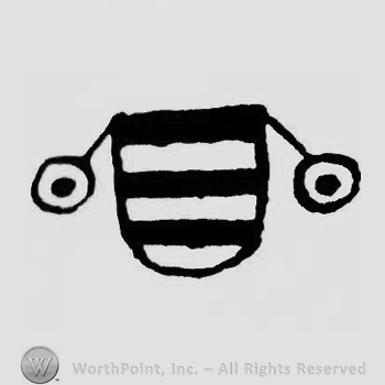 A shield with lines and two circles one side and another.