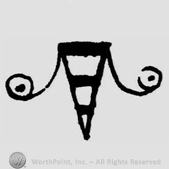 A shield with lines and two circles one side and another.