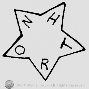 Raised star with the word North going counter clockwise