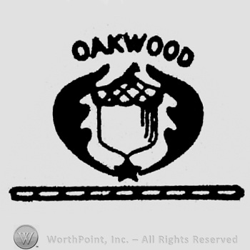 Image of an acorn between two leafs. Writing above: Oakwood.