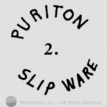 Purinton is curved written on top, Slip Ware is opposite curved on the bottom
