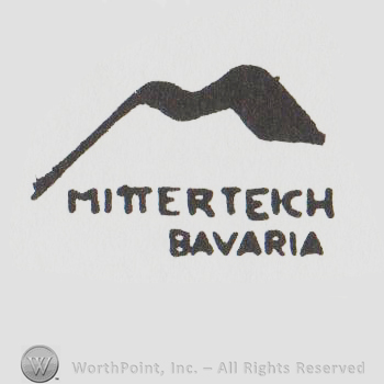 an M resimbling a mountain and the words MITTERTEICH BAVARIA in uppercase
